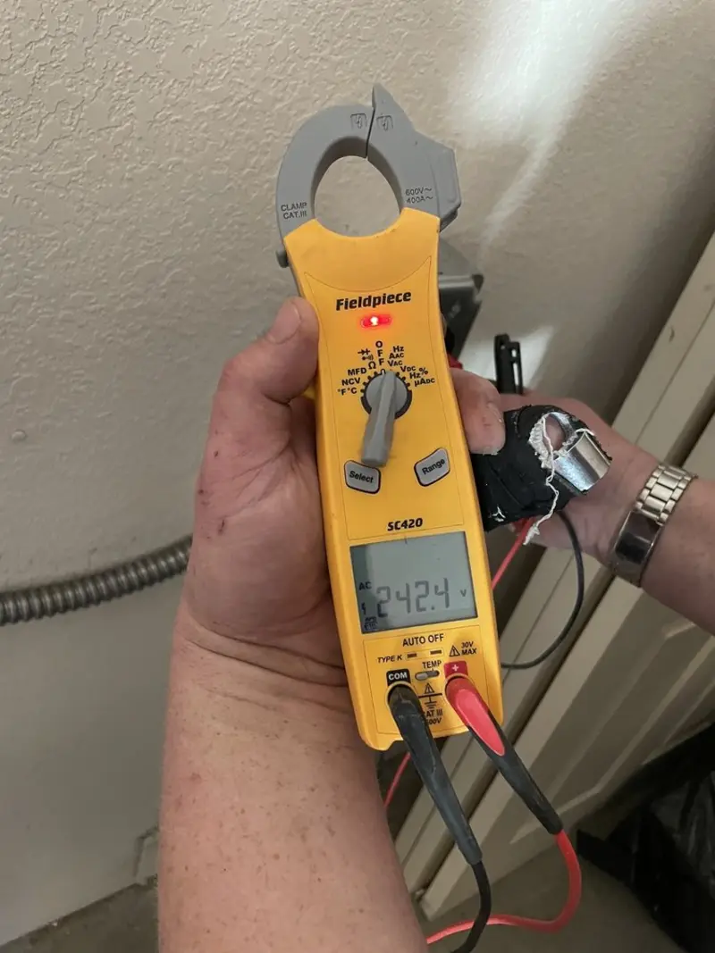 Voltage testing with clamp meter during Ceiling Fan Installation in Trent Woods